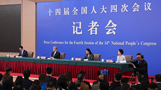 中共中央政治局委员、外交部长王毅就中国外交政策和对外关系回答中外记者提问