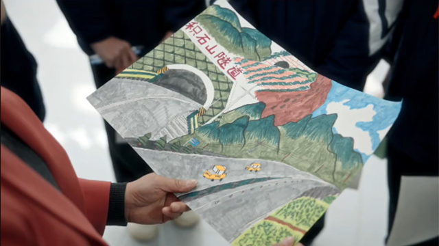 两会经纬线·一幅画里的两条路